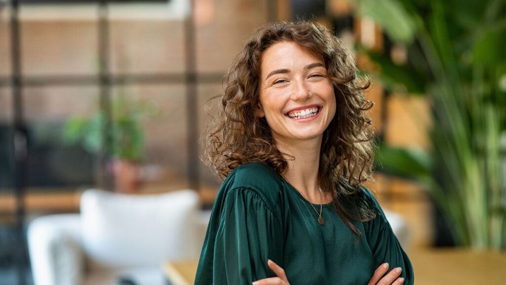 Woman Smiling After A Successful Brain Injury Compensation Claim